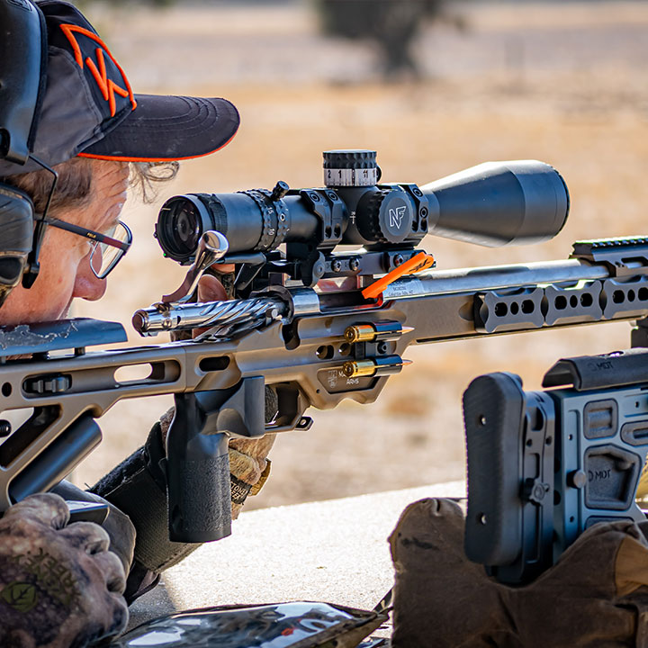 Precision sport rifle and scope in use